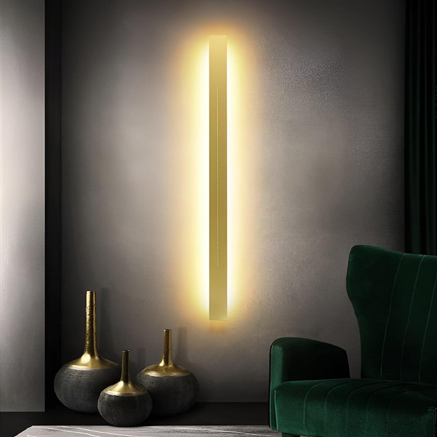 Modern LED wall sconce with warm lighting, styled with decorative vases and green armchair